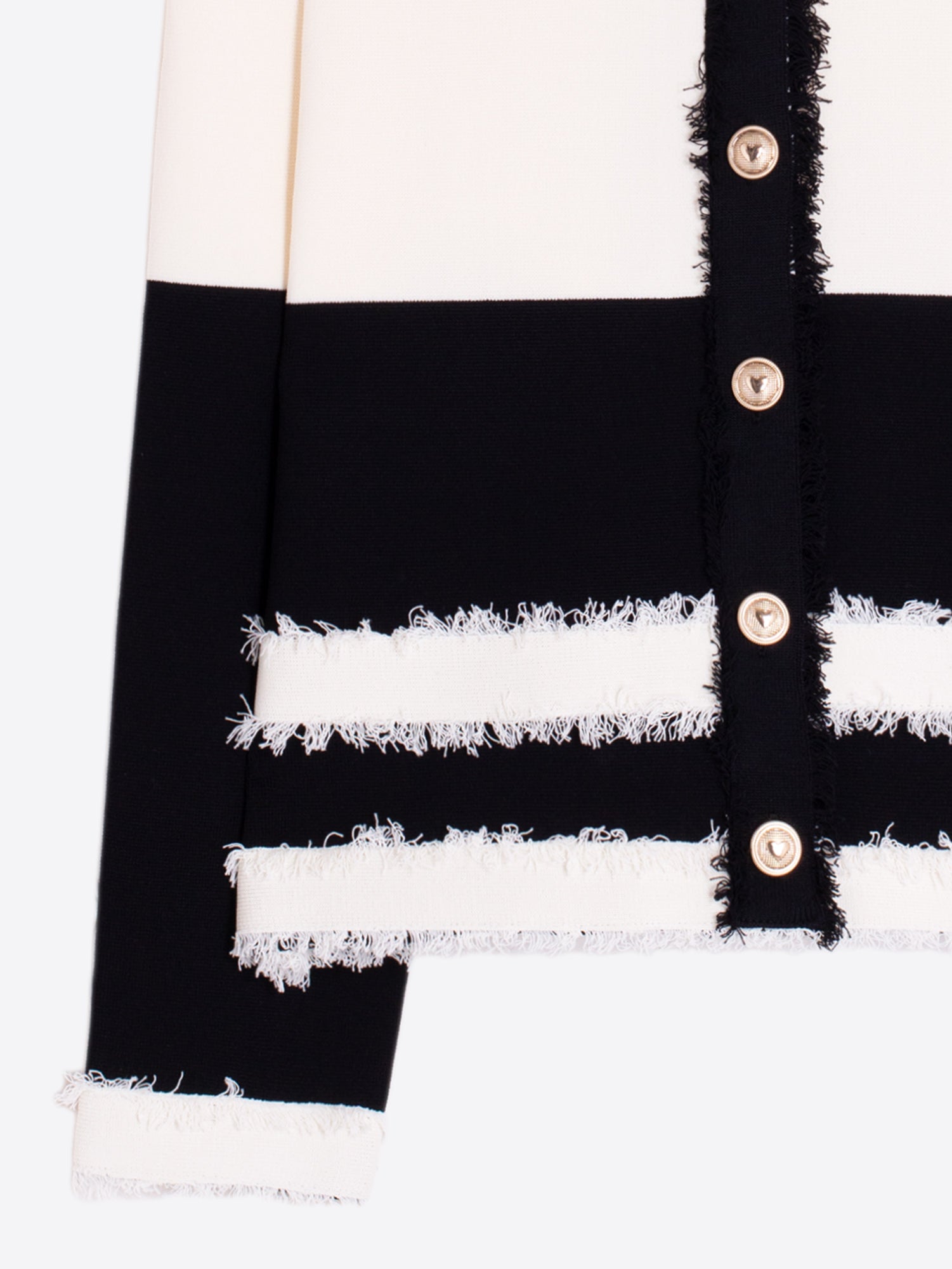 CHAQUETA BICOLOR NEGRO Y CRUDO RIBETES DESHILACHADOS