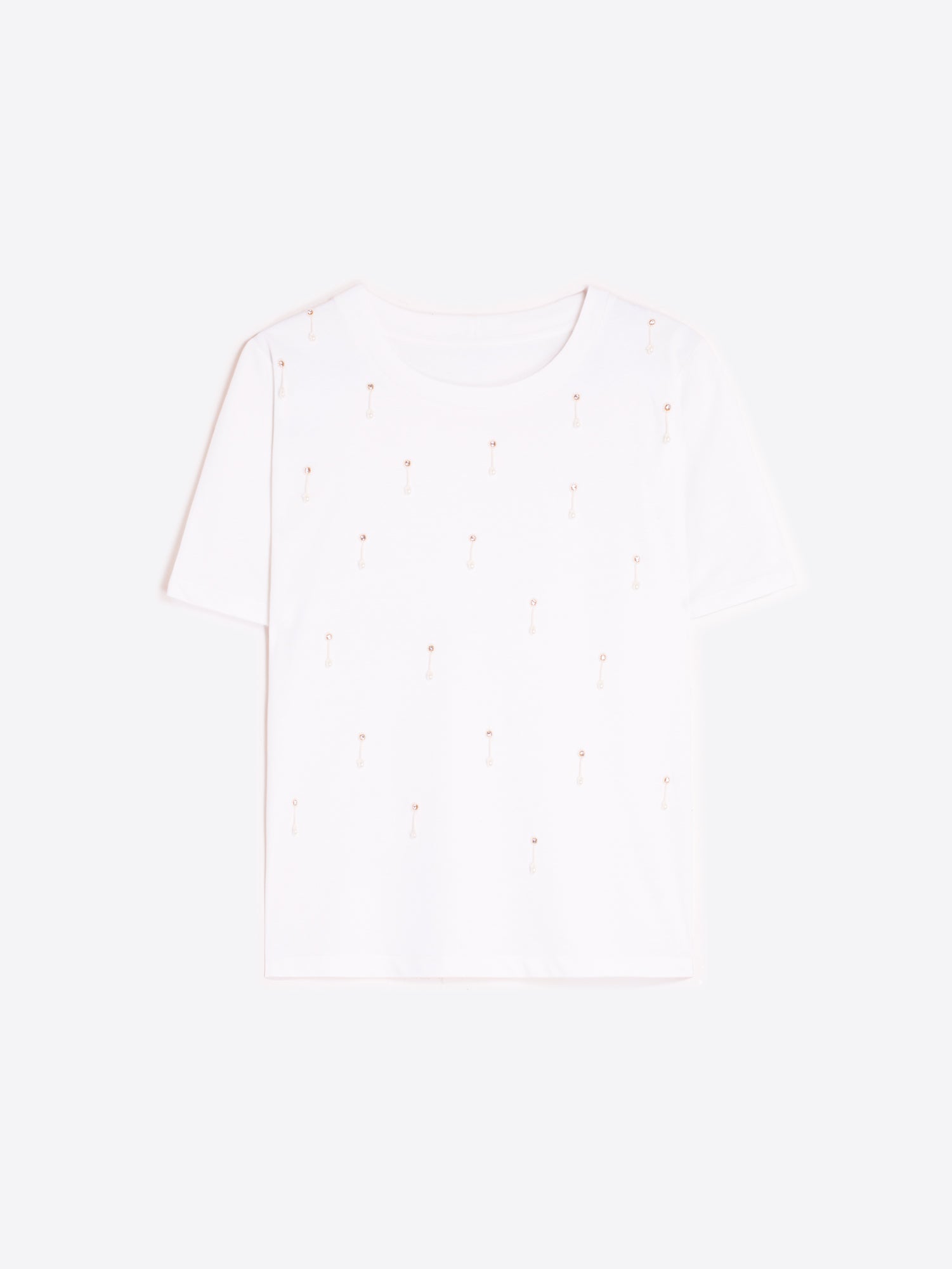 CAMISETA BLANCA APLICACIONES METÁLICAS